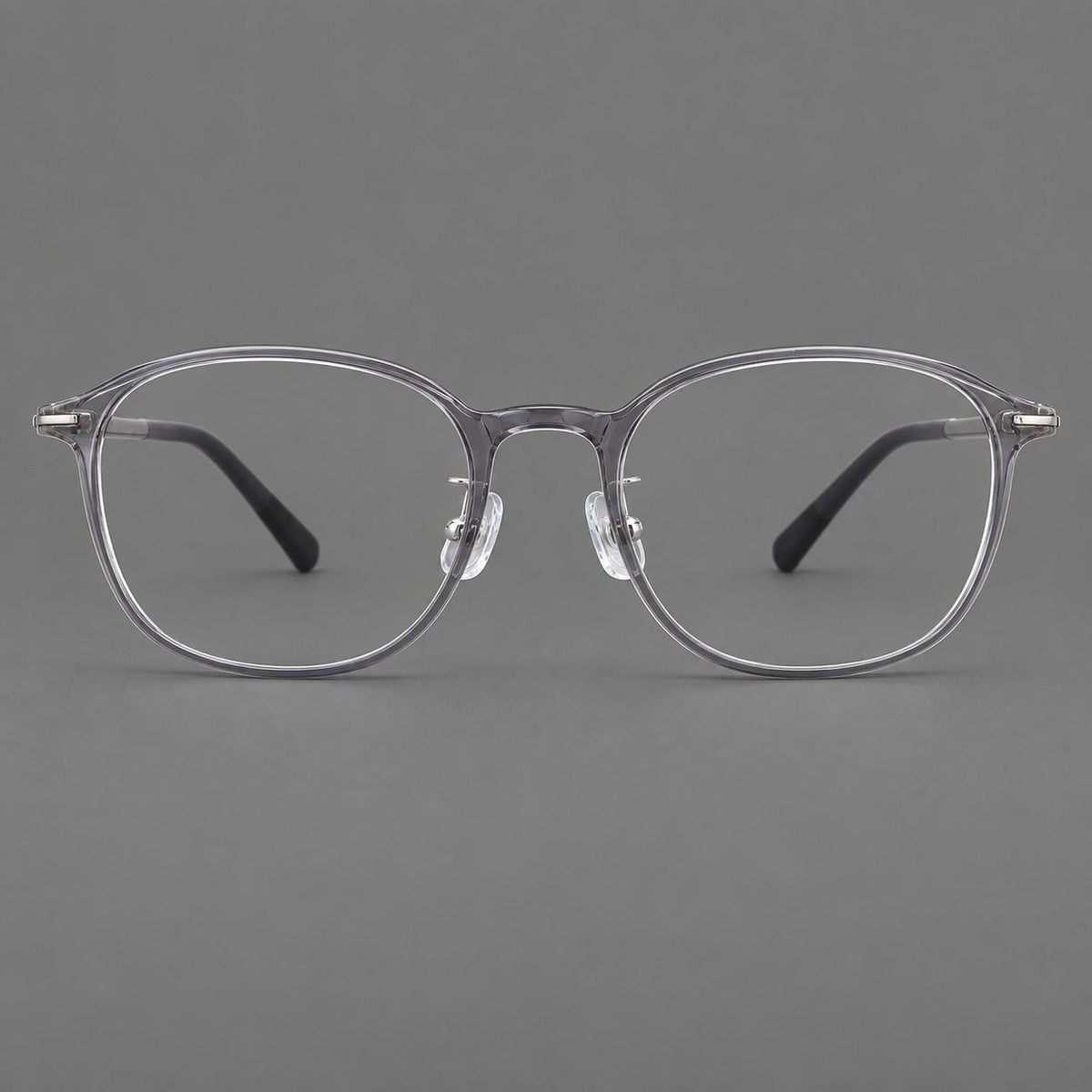 Soft square plastic eyeglasses with a raised browline and rounded lower corners in Clear Gray, front view