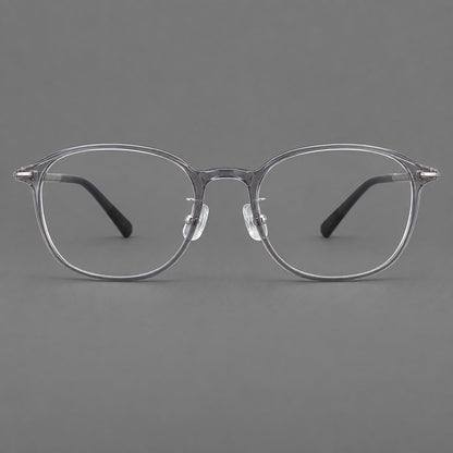 Soft square plastic eyeglasses with a raised browline and rounded lower corners in Clear Gray, front view frame detail