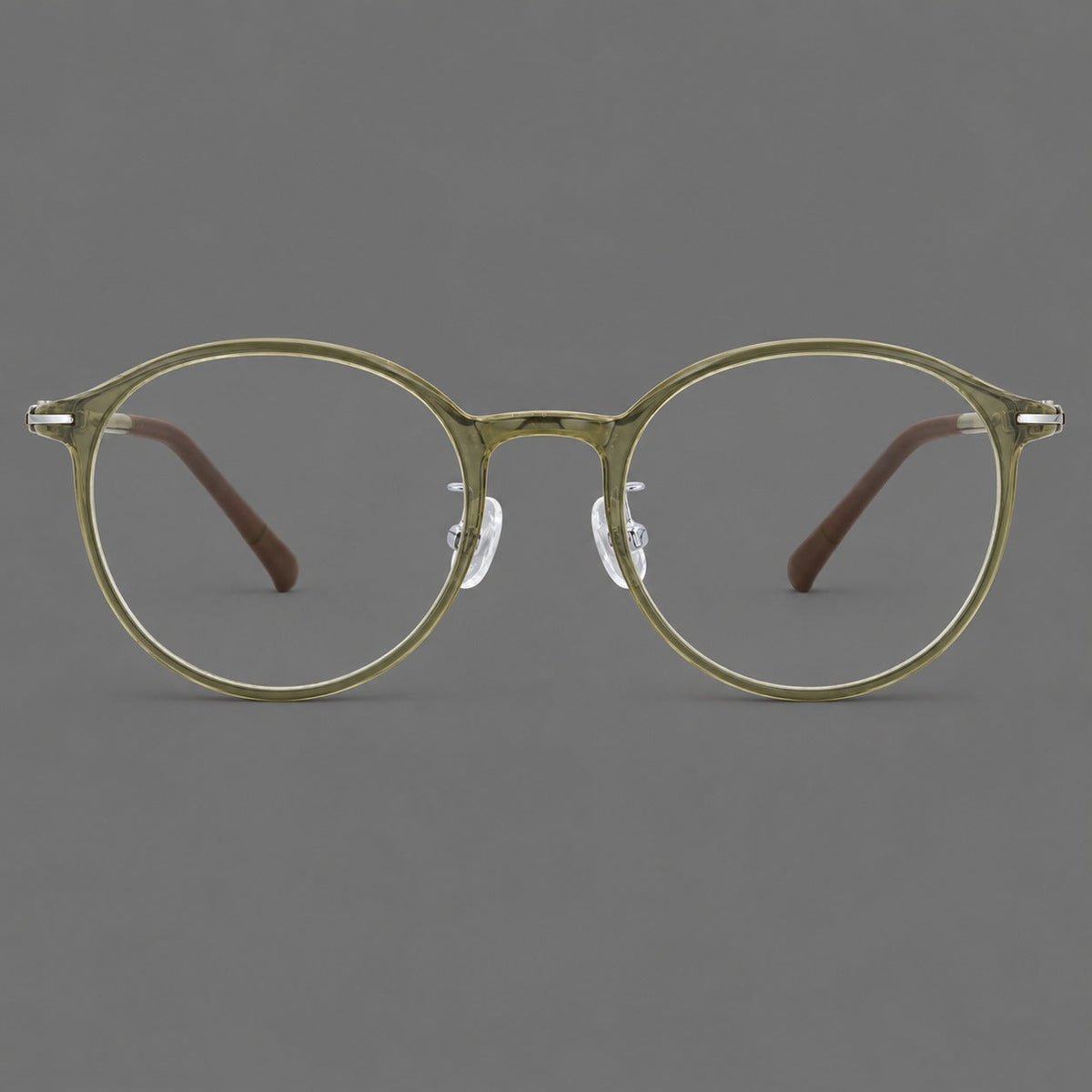 Compact round plastic eyeglasses with gently lifted corners and clear nose pads in Iced Green Tea, front view