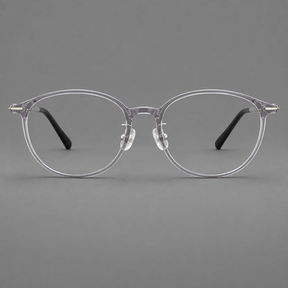 Slim oval plastic eyeglasses with a low profile and subtle metal corner accents in Clear Gray, front view frame detail