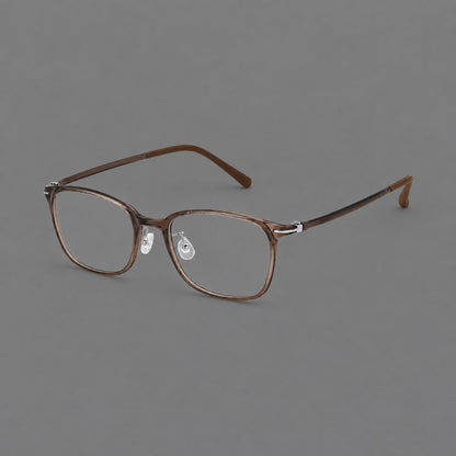 Classic square plastic eyeglasses with broad lenses and softly rounded edges in Ink Brown, three quarter view lens detail