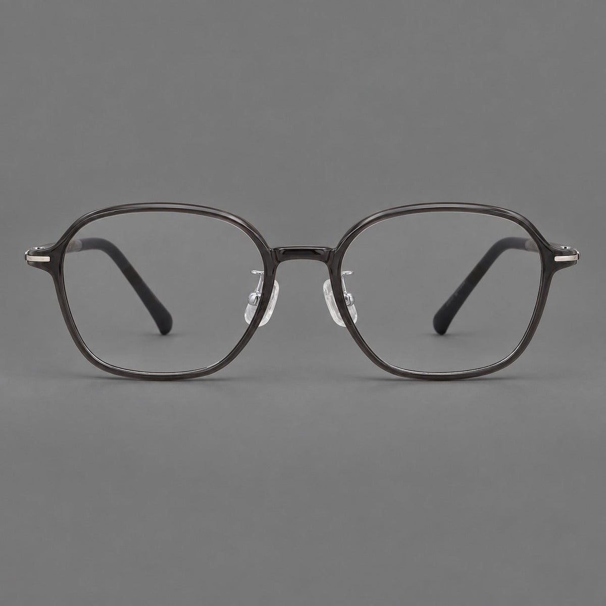 Rounded geometric plastic eyeglasses with softly angled rims and a curved bridge in Dark Gray, front view