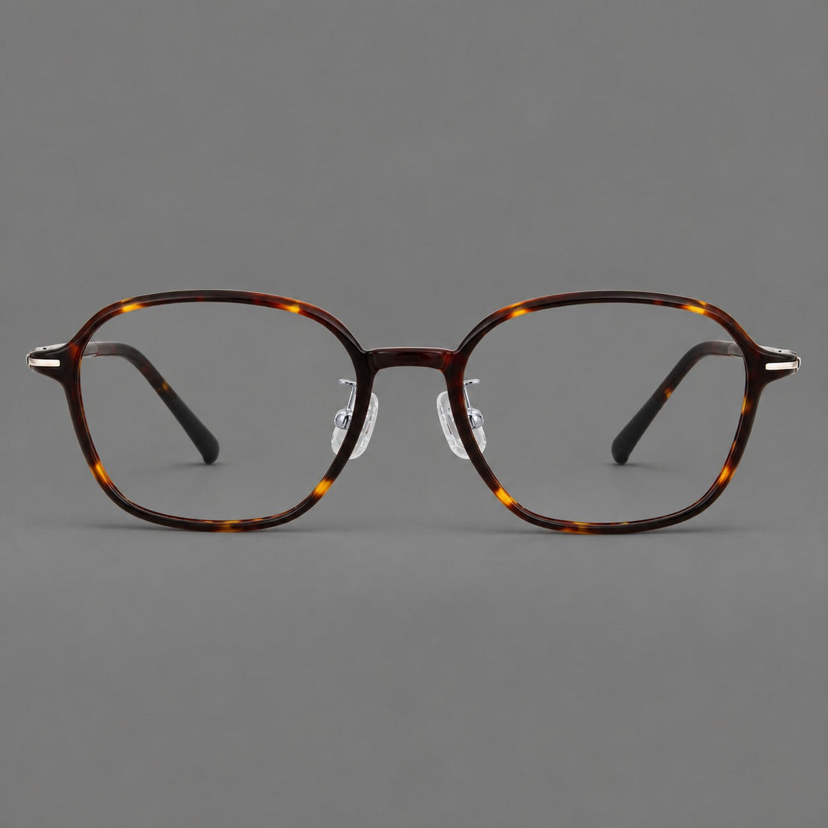 Rounded geometric plastic eyeglasses with softly angled rims and a curved bridge in Tortoiseshell, front view