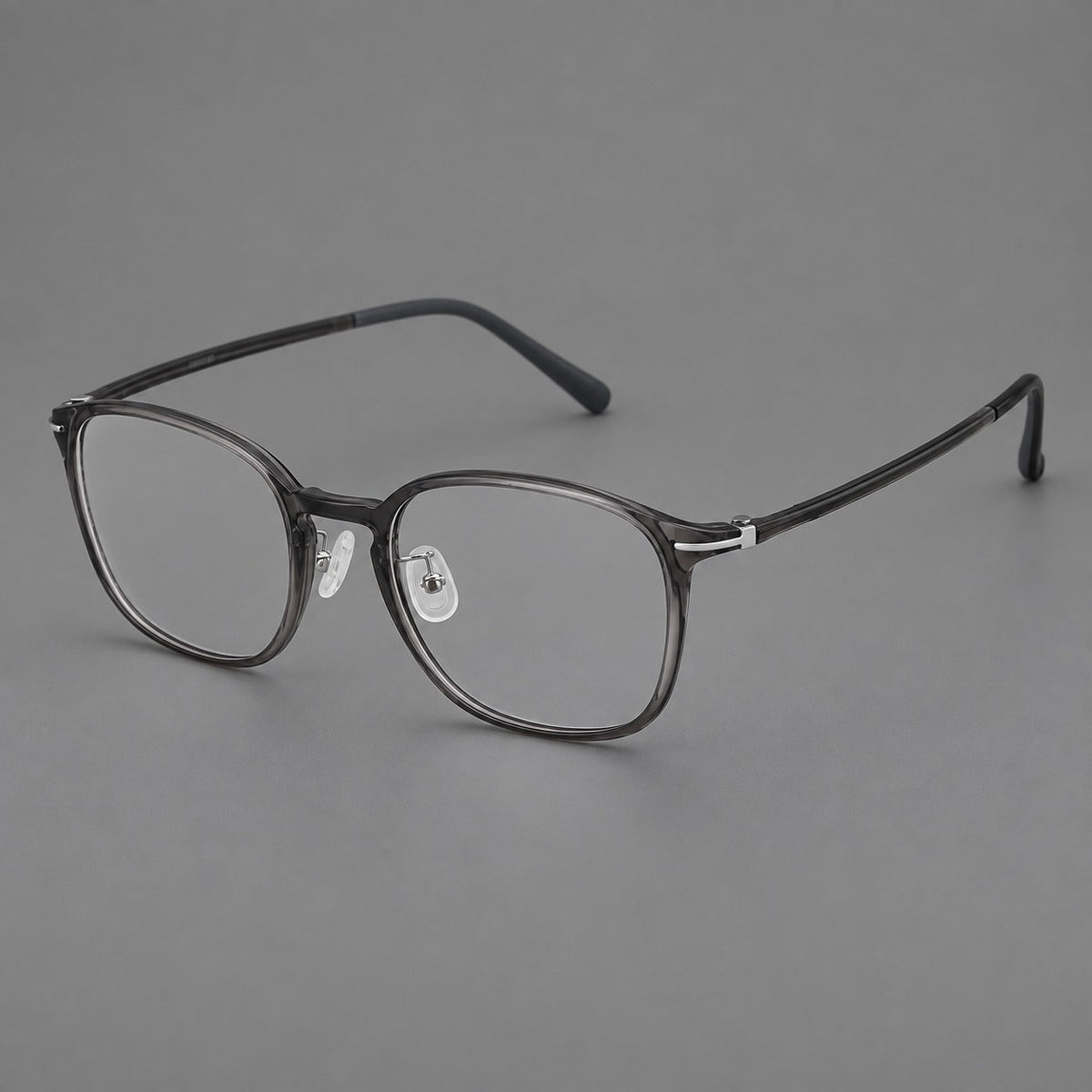 Vintage soft square plastic eyeglasses with deep lenses and a gently arched bridge in Dark Gray, three quarter view