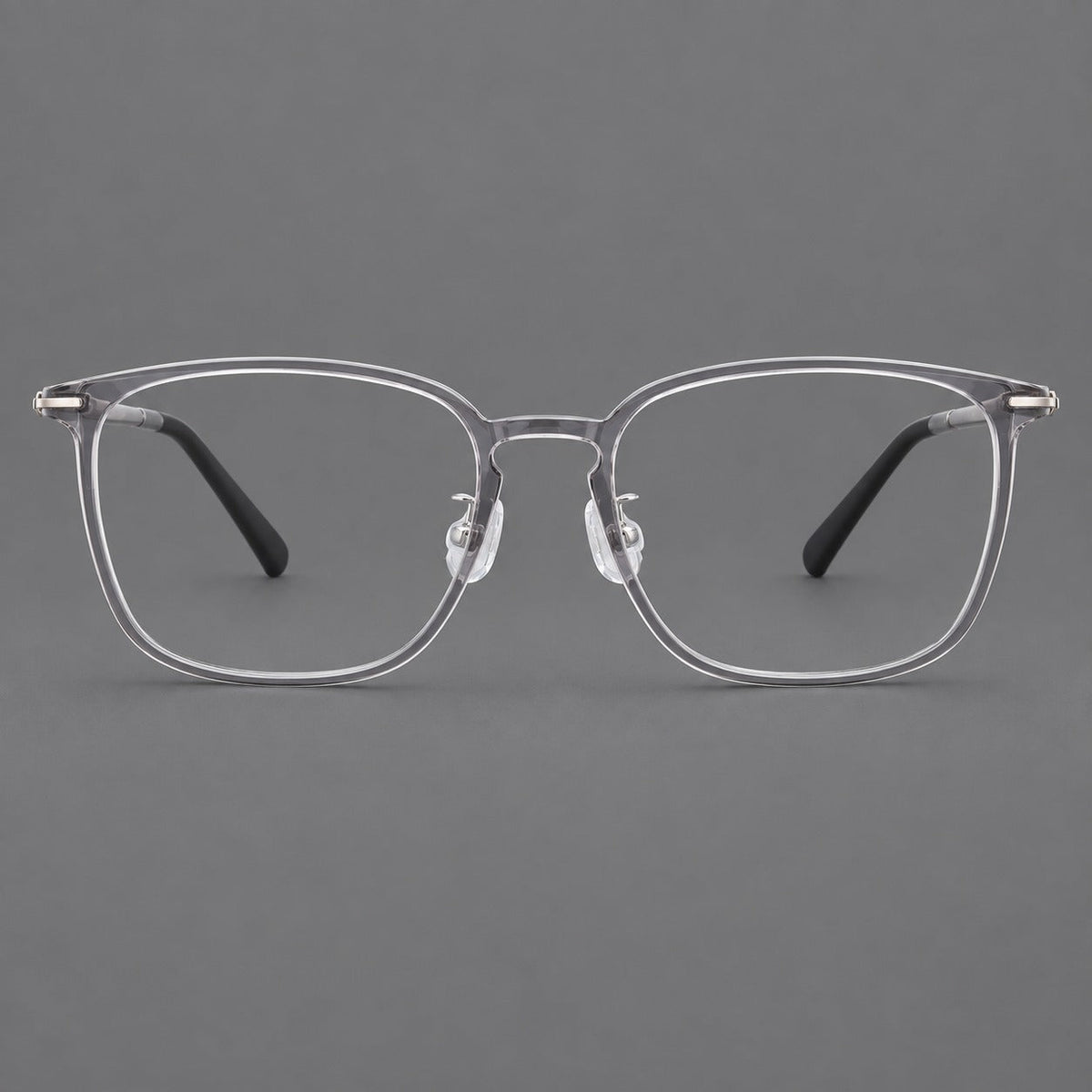 Bold square plastic eyeglasses with a defined browline and an open bridge in Clear Gray, front view