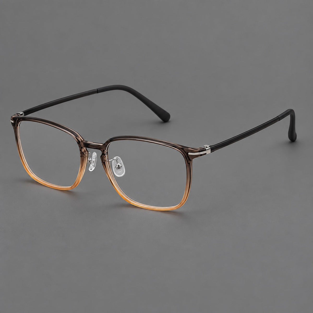 Bold square plastic eyeglasses with a defined browline and an open bridge in Gray Tea Gradient, three quarter view
