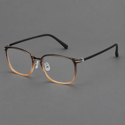 Bold square plastic eyeglasses with a defined browline and an open bridge in Gray Tea Gradient, three quarter view lens detail