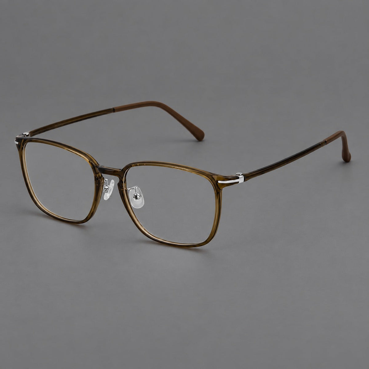 Bold square plastic eyeglasses with a defined browline and an open bridge in Dark Brown, three quarter view