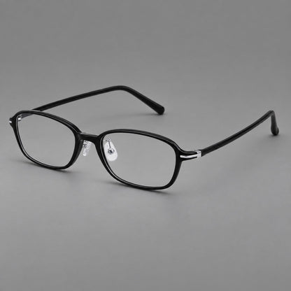 Soft oval plastic eyeglasses with a narrow bridge and gently rounded outer corners in Glossy Black, three quarter view