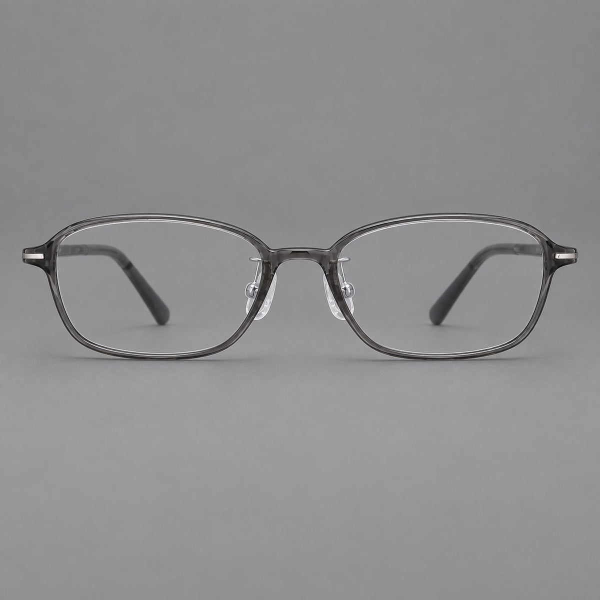 Soft oval plastic eyeglasses with a narrow bridge and gently rounded outer corners in Medium Gray, front view