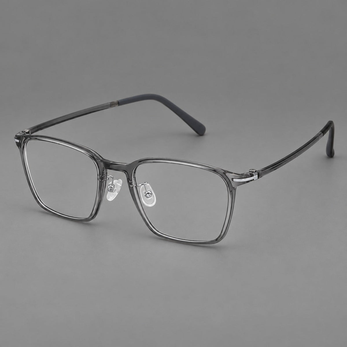Modern square plastic eyeglasses with a smooth browline and slim metal corner details in Medium Gray, three quarter view