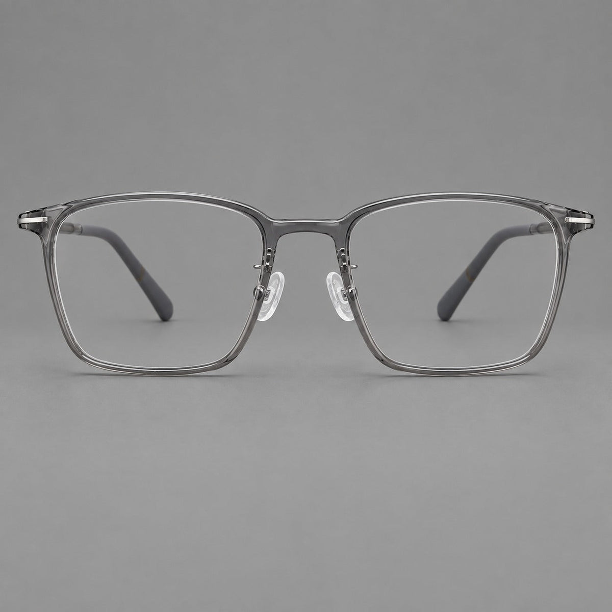Modern square plastic eyeglasses with a smooth browline and slim metal corner details in Medium Gray, front view