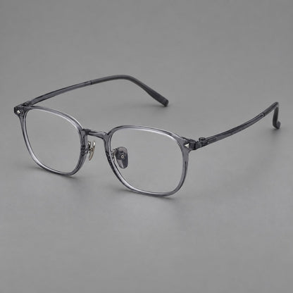 Retro square plastic eyeglasses with a curved bridge and triangular corner details in Ink Gray, three quarter view front view