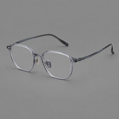 Soft square plastic eyeglasses with rounded lower rims and a broad curved bridge in Ink Gray, three quarter view front view