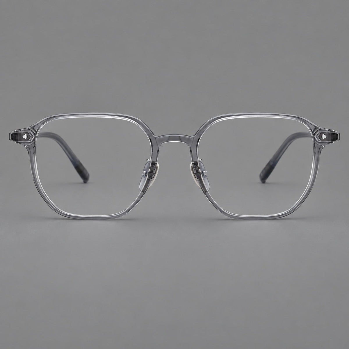Soft square plastic eyeglasses with rounded lower rims and a broad curved bridge in Ink Gray, front view