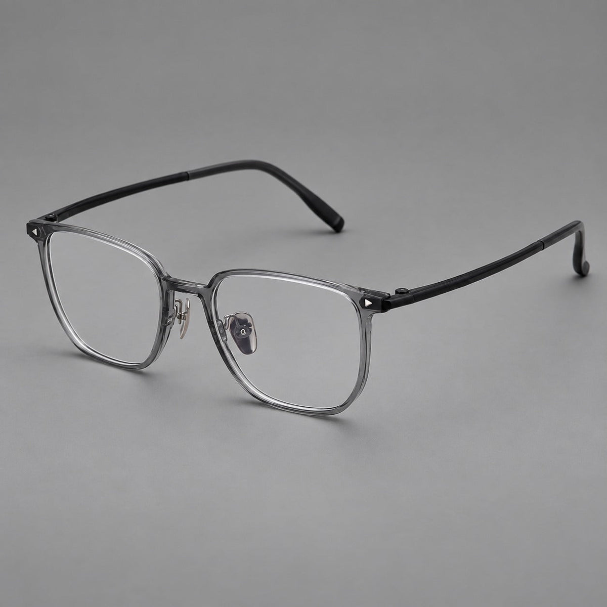 Refined rectangular plastic eyeglasses with raised outer corners and clear nose pads in Medium Gray, three quarter view