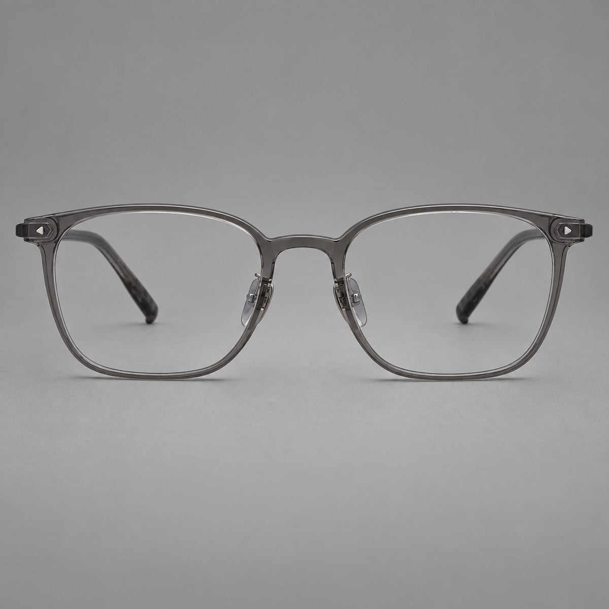 Classic soft square plastic eyeglasses with a gently curved browline and corner studs in Dark Gray, front view