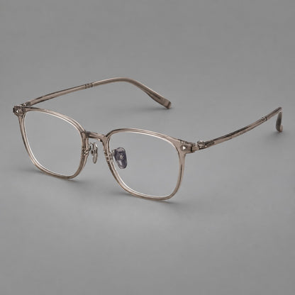 Classic soft square plastic eyeglasses with a gently curved browline and corner studs in Gray Brown, three quarter view lens detail
