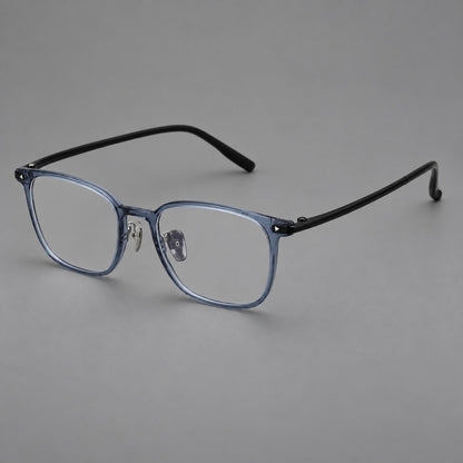 Classic soft square plastic eyeglasses with a gently curved browline and corner studs in Slate Blue, three quarter view additional product view
