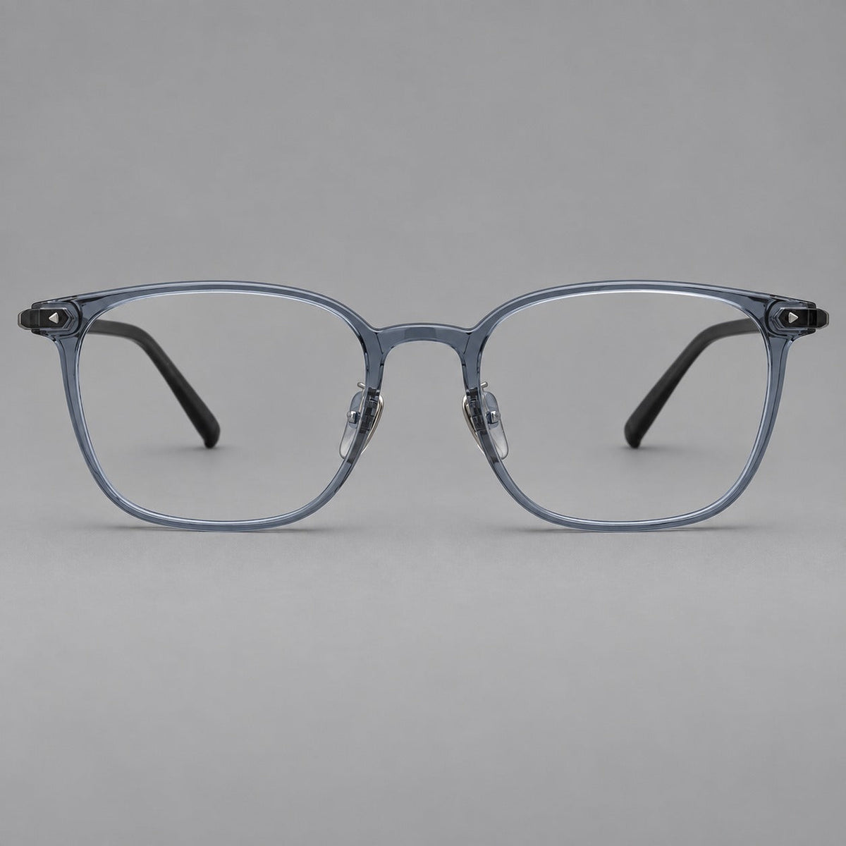 Classic soft square plastic eyeglasses with a gently curved browline and corner studs in Slate Blue, front view