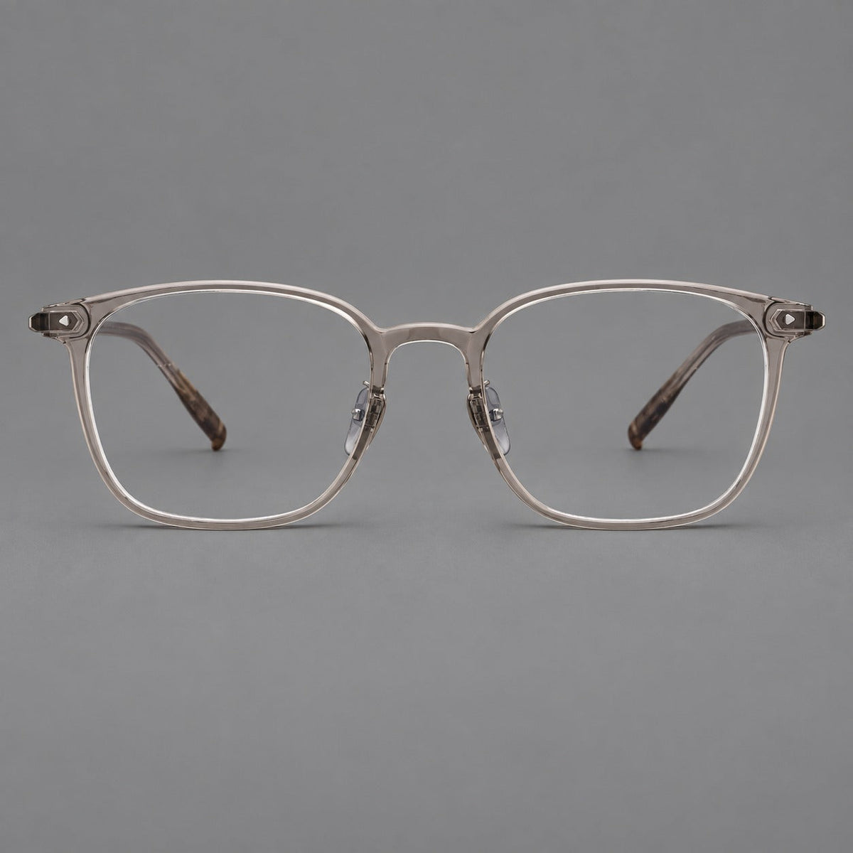 Classic soft square plastic eyeglasses with a gently curved browline and corner studs in Gray Tea, front view