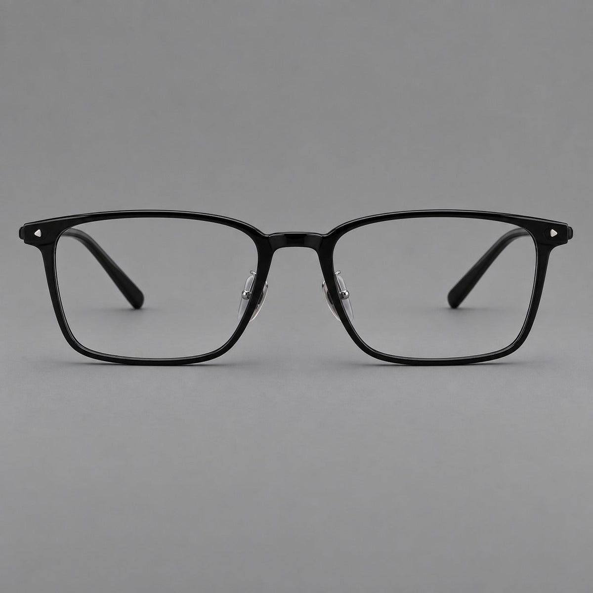 Clean rectangular plastic eyeglasses with flat lower rims and pointed corner details in Glossy Black, front view