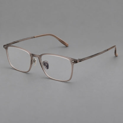 Clean rectangular plastic eyeglasses with flat lower rims and pointed corner details in Matte Tea, three quarter view lens detail
