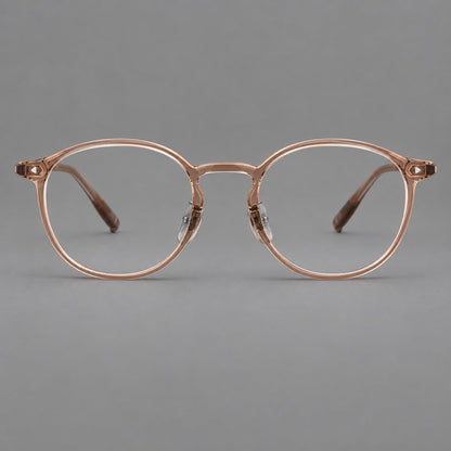 Vintage round plastic eyeglasses with a curved bridge and subtle triangular accents in Tea, front view temple detail