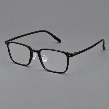 Everyday rectangular plastic eyeglasses with rounded edges and a narrow bridge in Glossy Black, three quarter view