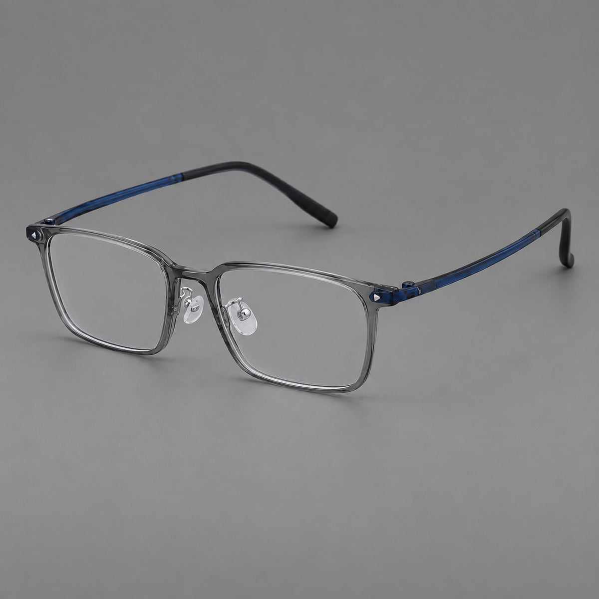 Everyday rectangular plastic eyeglasses with rounded edges and a narrow bridge in Medium Gray, three quarter view