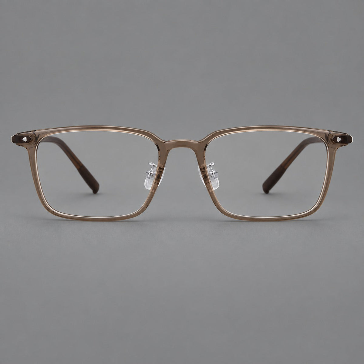 Everyday rectangular plastic eyeglasses with rounded edges and a narrow bridge in Brown, front view