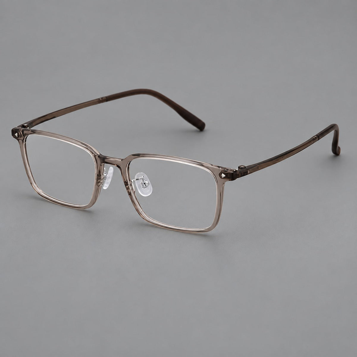 Everyday rectangular plastic eyeglasses with rounded edges and a narrow bridge in Gray Brown, three quarter view