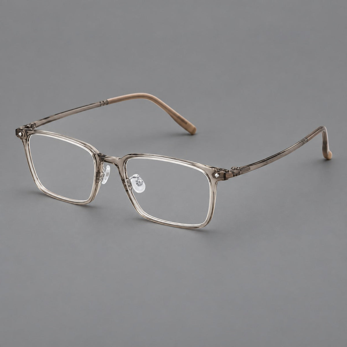 Everyday rectangular plastic eyeglasses with rounded edges and a narrow bridge in Gray Tea, three quarter view