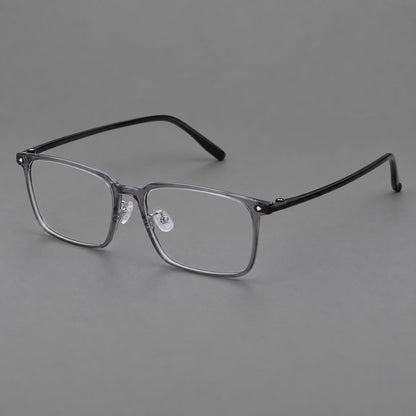 Wide rectangular plastic eyeglasses with an angular browline and slender rims in Medium Gray, three quarter view front view