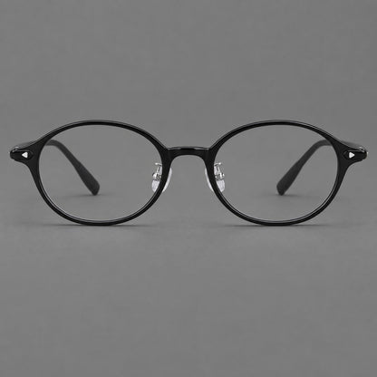 Retro round plastic eyeglasses with softly lifted corners and a sculpted bridge in Glossy Black, front view side view