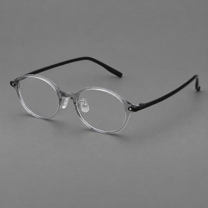 Retro round plastic eyeglasses with softly lifted corners and a sculpted bridge in Gray, three quarter view front view