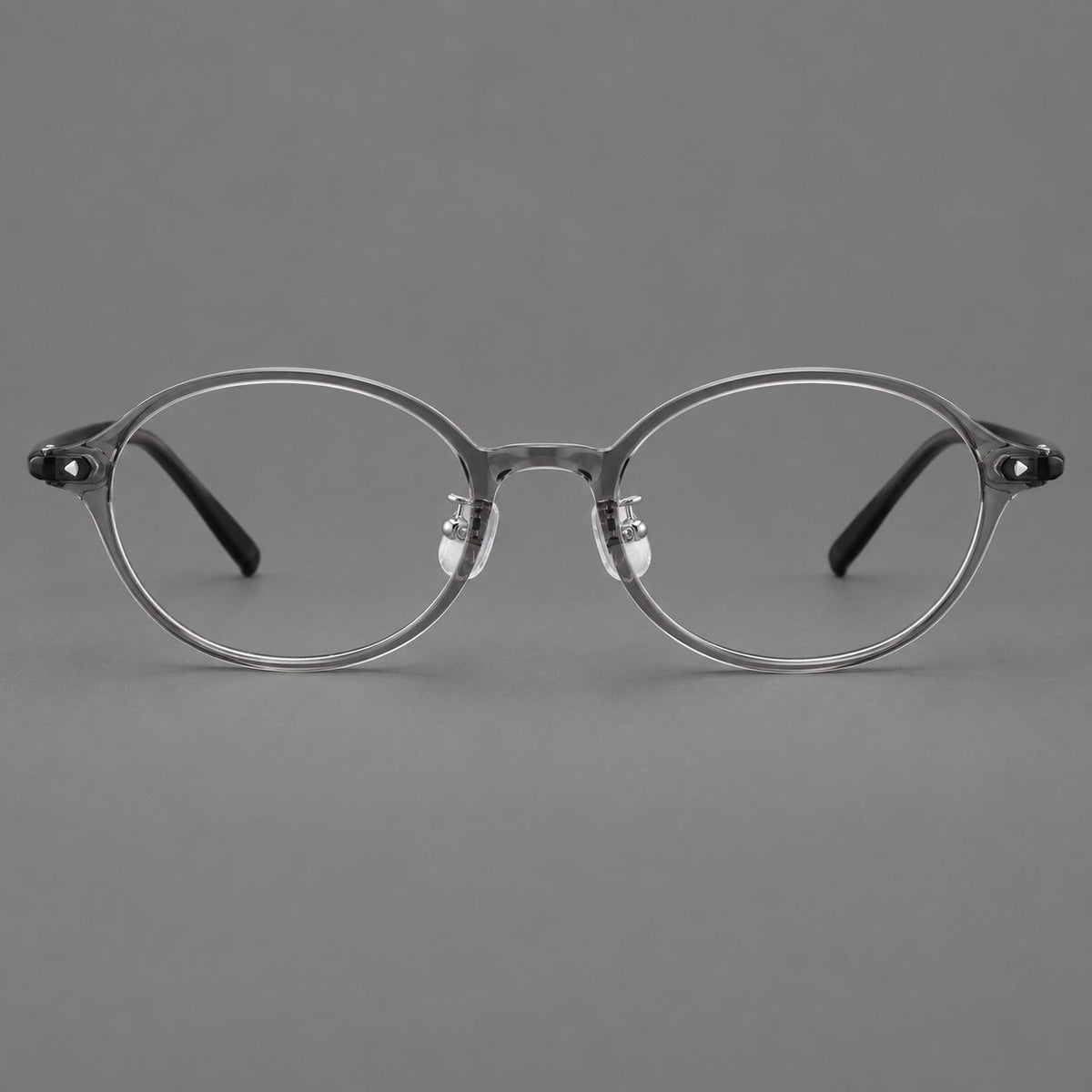 Retro round plastic eyeglasses with softly lifted corners and a sculpted bridge in Gray, front view