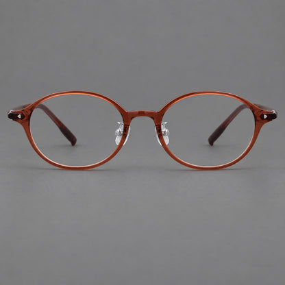 Retro round plastic eyeglasses with softly lifted corners and a sculpted bridge in Brown Red, front view temple detail
