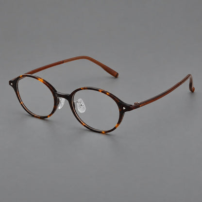 Retro round plastic eyeglasses with softly lifted corners and a sculpted bridge in Tortoiseshell, three quarter view additional product view