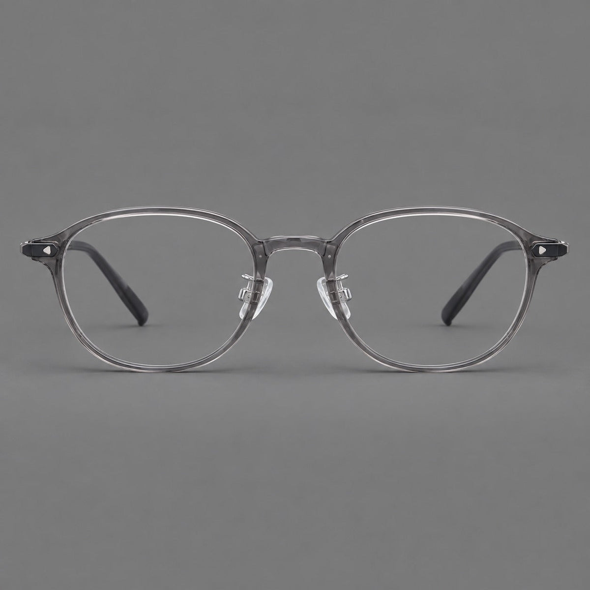 Panto plastic eyeglasses with a rounded silhouette and triangular corner studs in Gray, front view