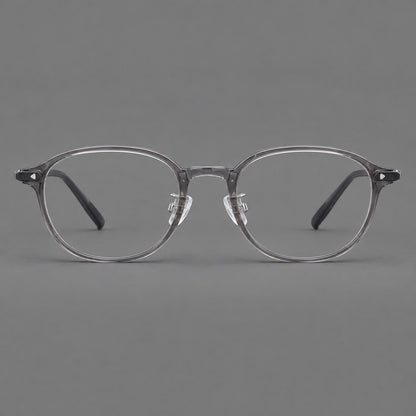 Panto plastic eyeglasses with a rounded silhouette and triangular corner studs in Gray, front view frame detail