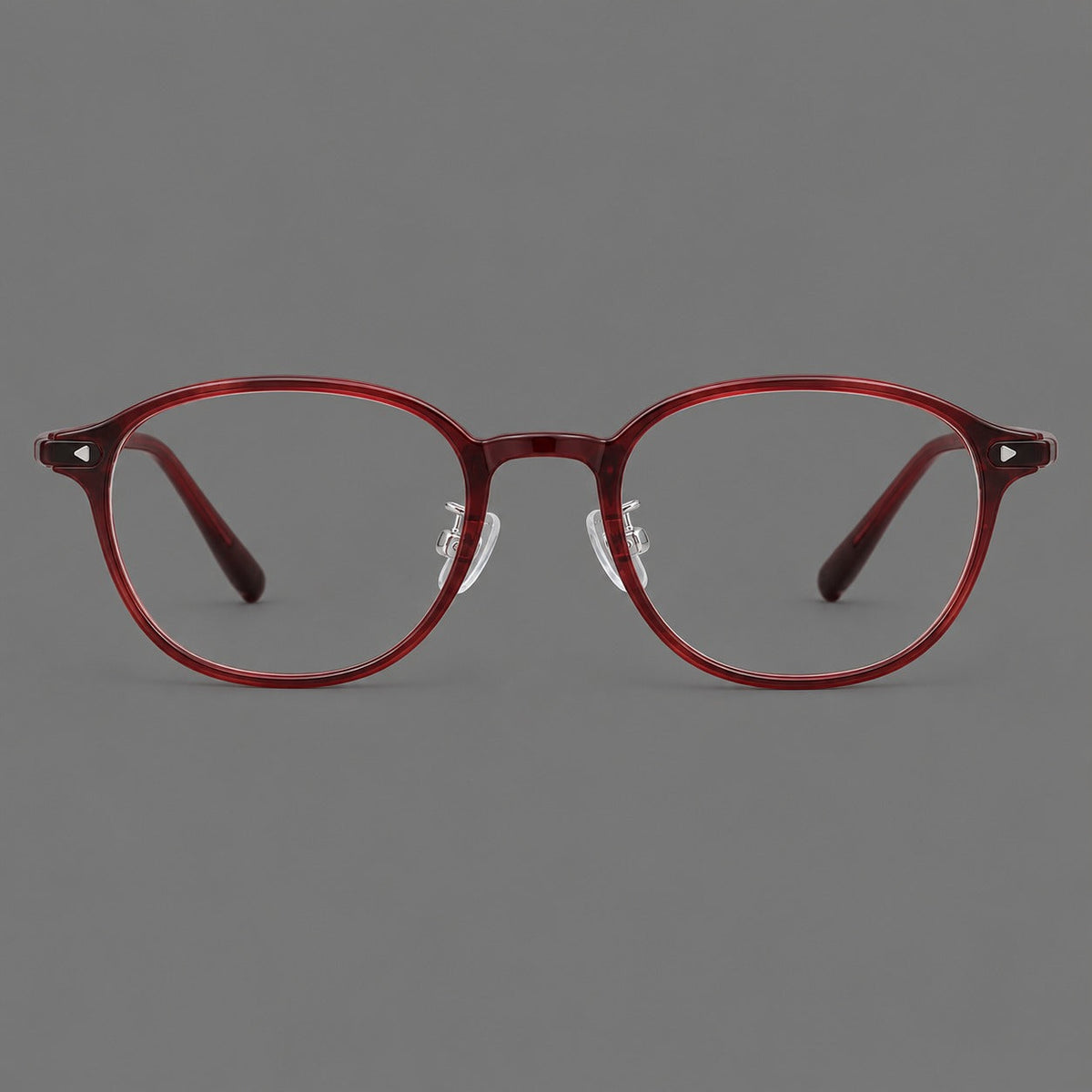 Panto plastic eyeglasses with a rounded silhouette and triangular corner studs in Burgundy, front view