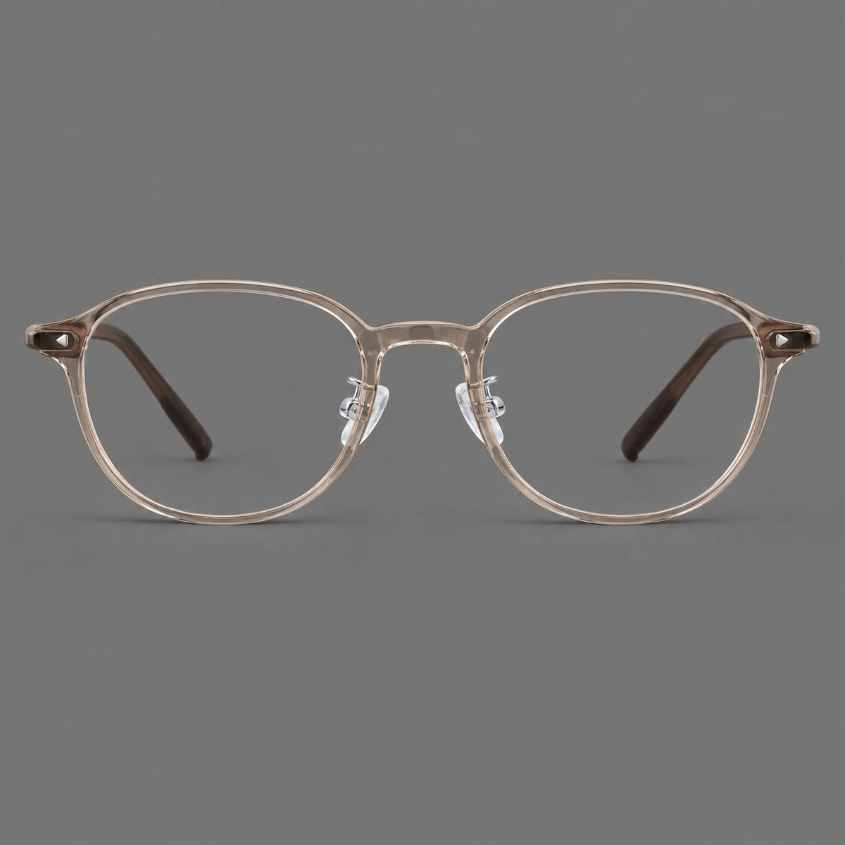 Panto plastic eyeglasses with a rounded silhouette and triangular corner studs in Tea, front view