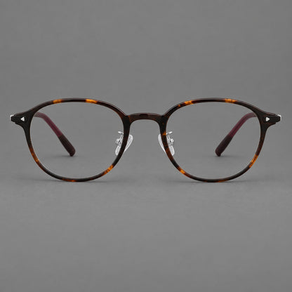 Panto plastic eyeglasses with a rounded silhouette and triangular corner studs in Tortoiseshell, front view additional product view