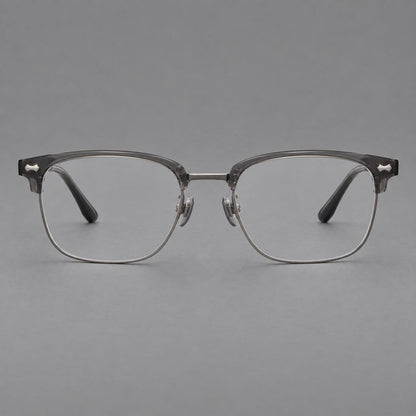 Classic browline titanium glasses with fine lower rims and subtle corner accents in Gunmetal, front view frame detail