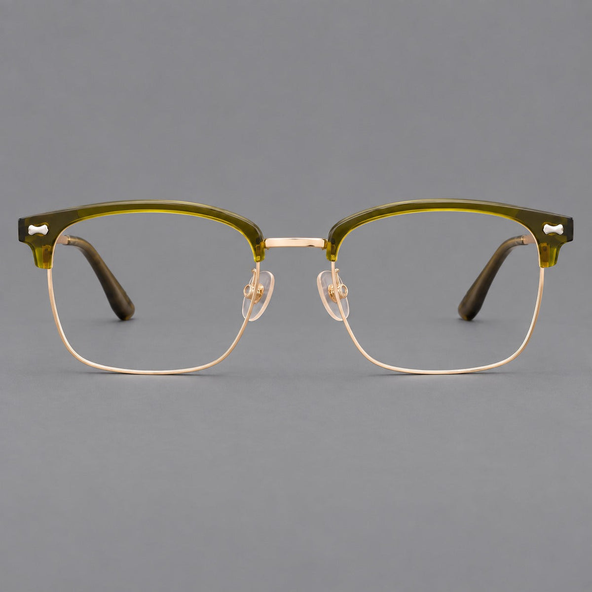 Classic browline titanium glasses with fine lower rims and subtle corner accents in Green and Gold, front view