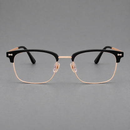 Classic browline titanium glasses with fine lower rims and subtle corner accents in Black and Rose Gold, front view additional product view