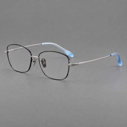 Soft square titanium glasses with angled upper corners and decorated hinges in Black and Silver, three quarter view front view