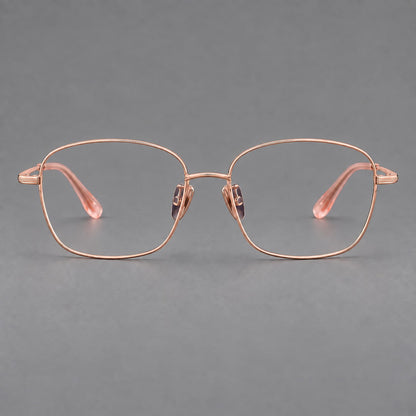 Soft square titanium glasses with angled upper corners and decorated hinges in Rose Gold, front view additional product view