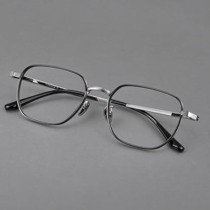 Retro square titanium glasses with rounded rims and finely grooved shoulders in Black and Silver, three quarter view front view